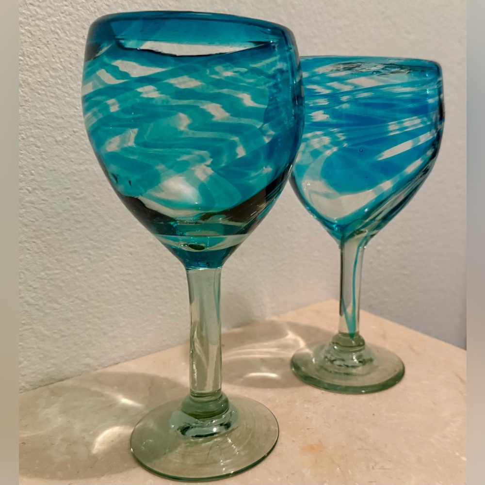 2 aquamarine hand blown swirl wine glasses. Made in Mexico